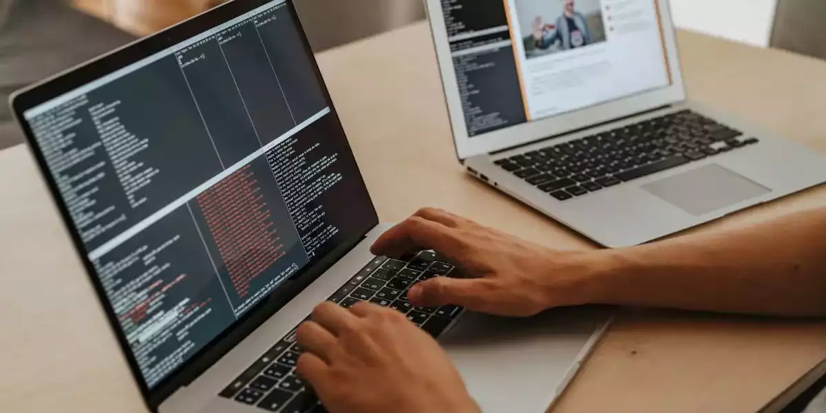 A close-up of a computer screen displaying lines of code in a text editor. The code is written in a programming language and is used to create software programs and applications. coding